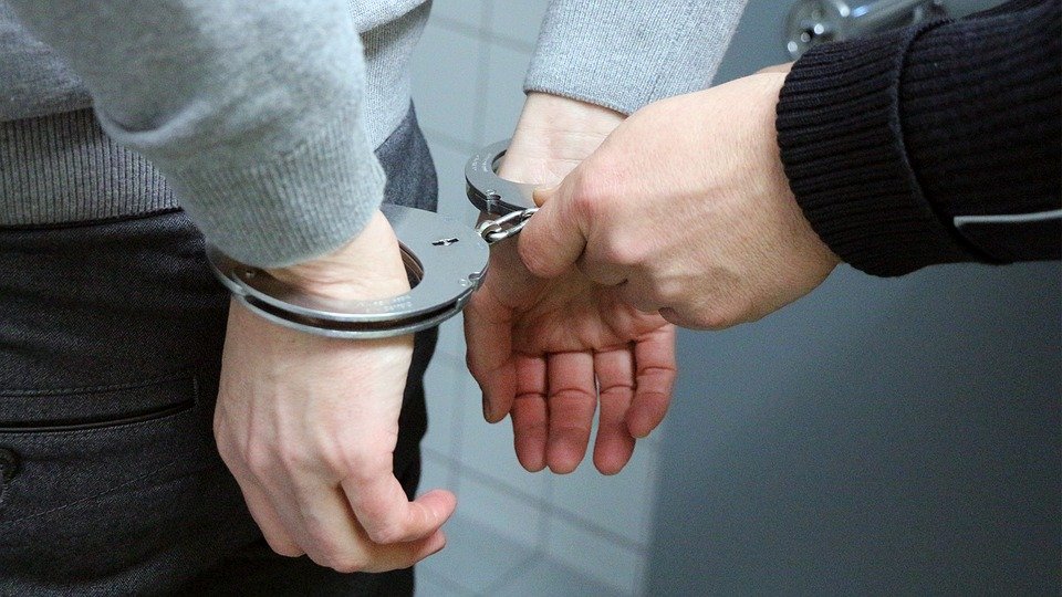 arrested man and police